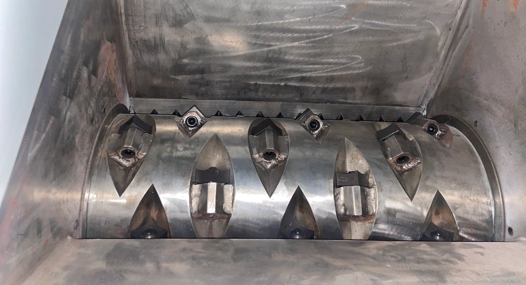 Interior of an HSS-600 Small Shredder cutting chamber showing the rotor and cutting blades.