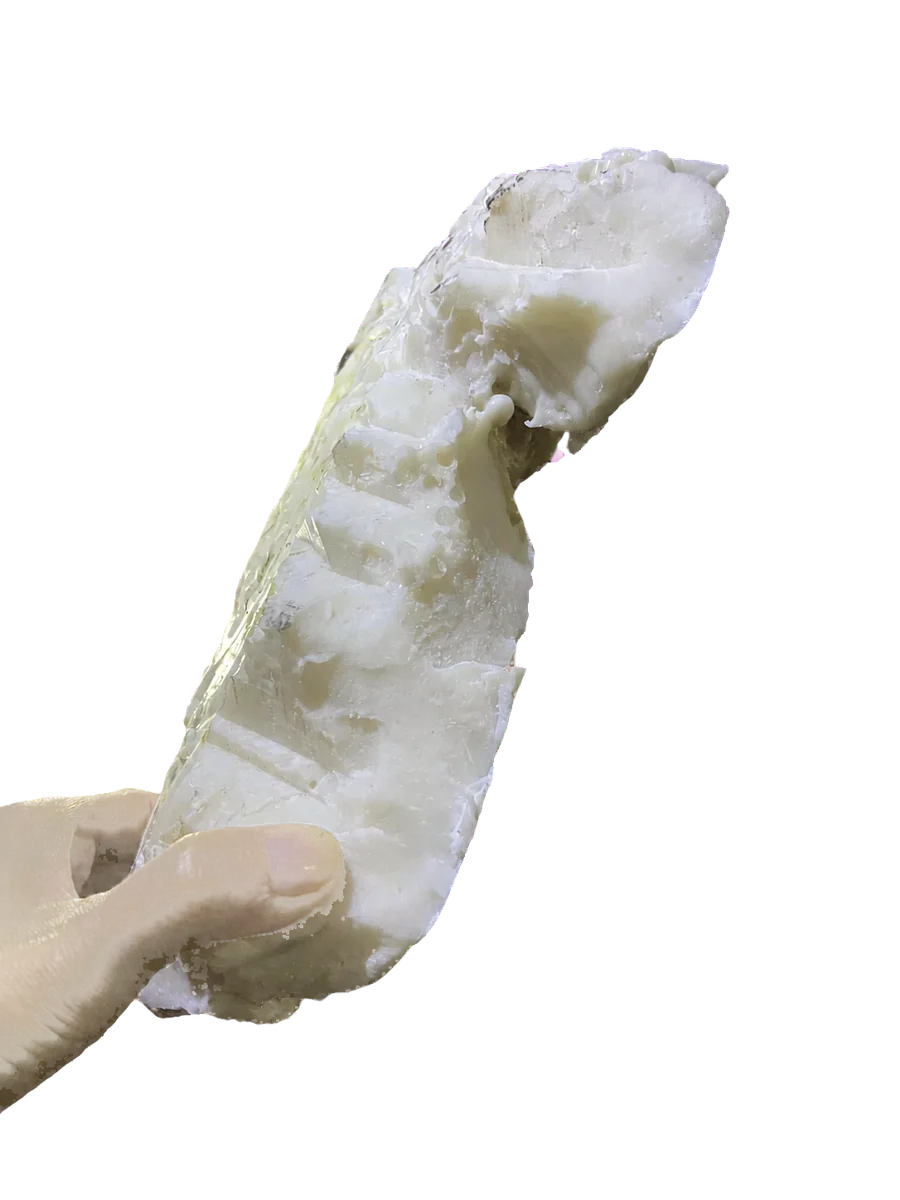 Side view showing the thick cross-section of a plastic purge lump.